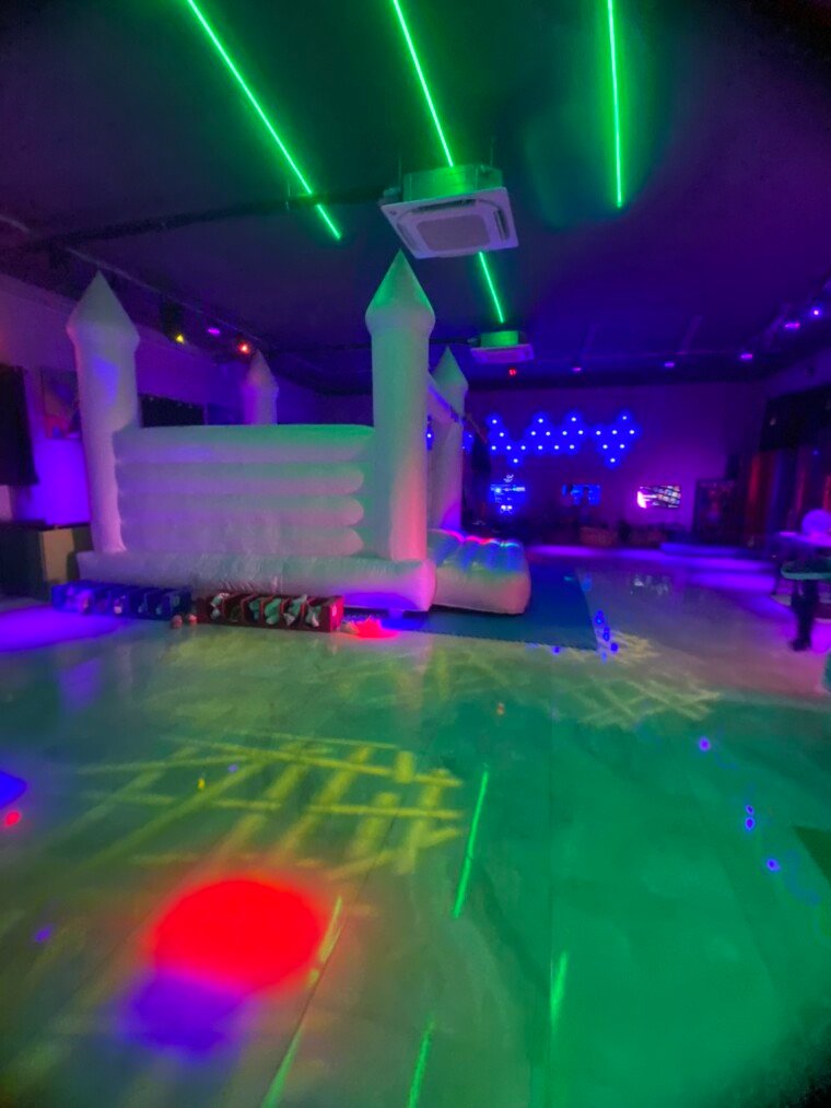 white bouncing castle side shot
