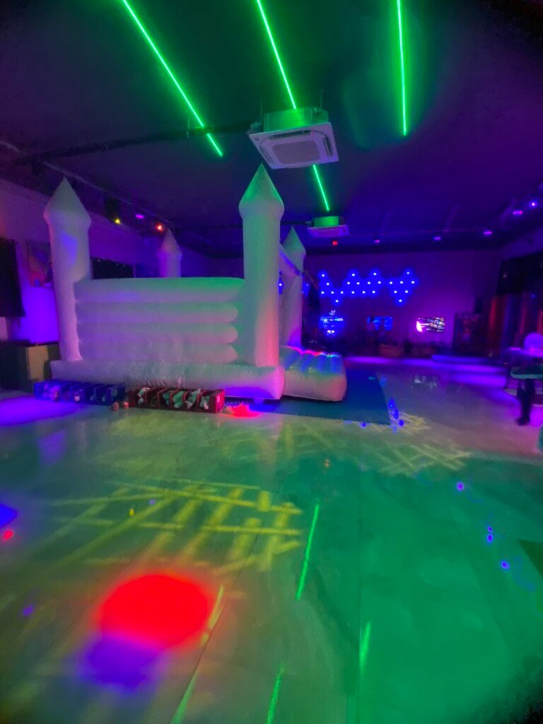 white bouncing castle side shot