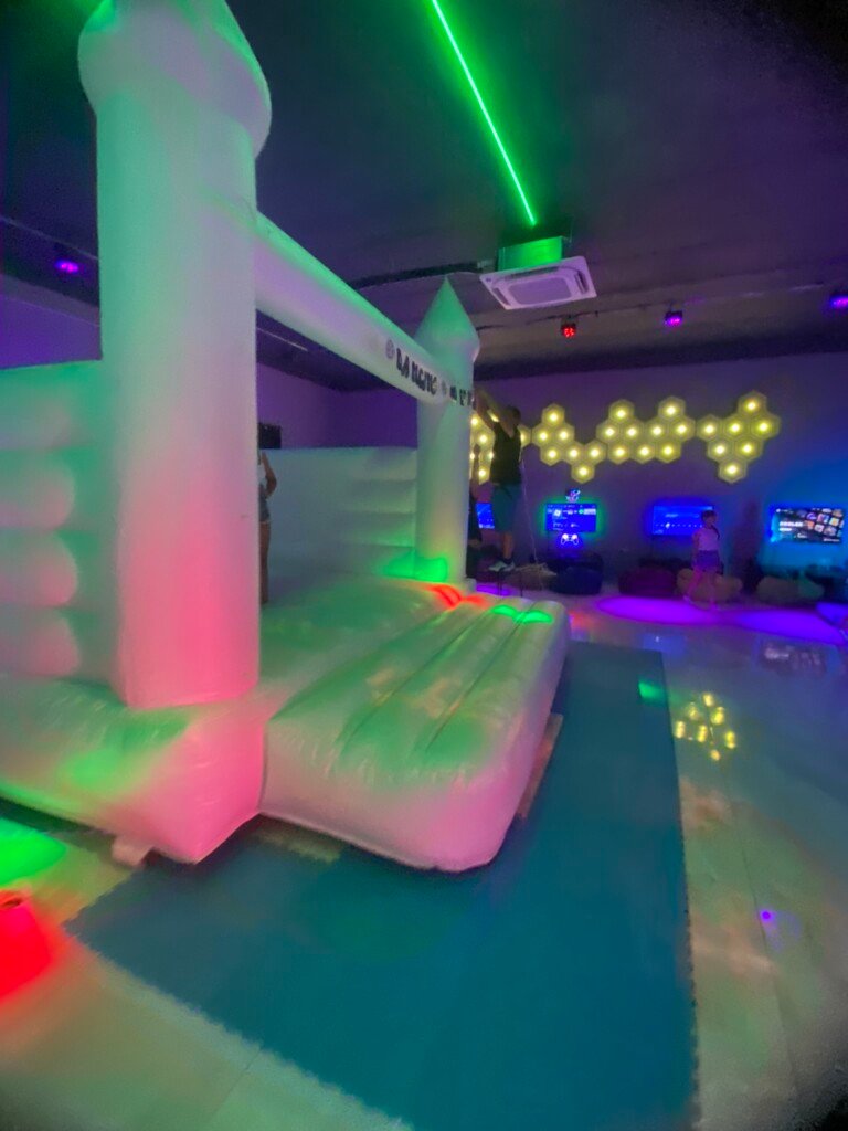 white bouncing castle sideshot