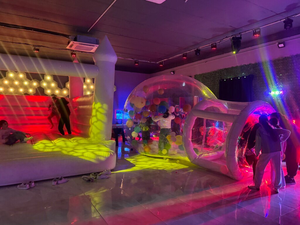 white bouncing castle with bubble house